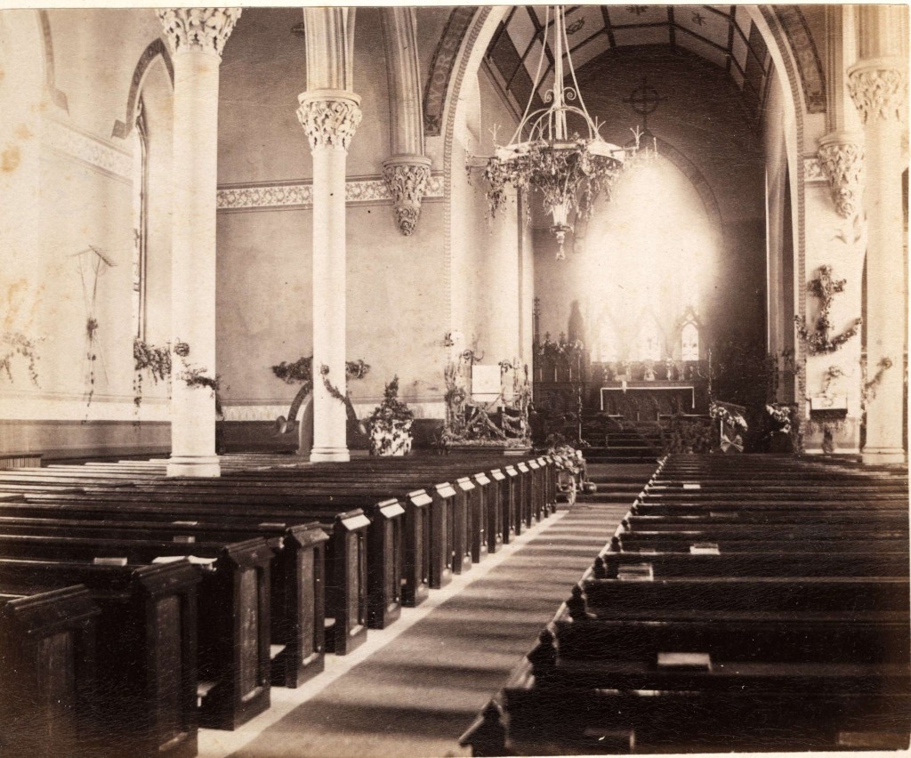 The earliest photograph, about 1875, of the interior of St Paul's Church by photographer James W. Powell from his studio album that he used to advertise the diversity and quality of his photographic work. (Queen's University Archives)